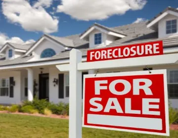House with foreclouse sign